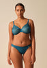 Full-body view of a women model wearing Gossard teal  Thong