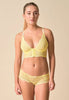 Full-body view of a women model wearing Gossard lemon microfibre Deep V Bralet