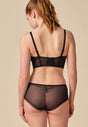 General view of a women model wearing Gossard black  Short
