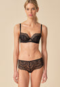 General view of a women model wearing Gossard black  Short