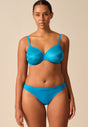 Full-body view of a women model wearing Gossard atomic blue microfibre Sheer Bra