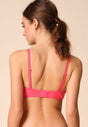 Back view of a women model wearing Gossard paradise pink microfibre Sheer Bra