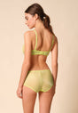 General view of a women model wearing Gossard sunny lime microfibre Sheer Bra