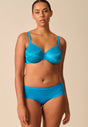 Full-body view of a women model wearing Gossard atomic blue microfibre Short