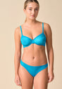 Full-body view of a women model wearing Gossard atomic blue microfibre Thong