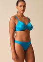 General view of a women model wearing Gossard atomic blue microfibre Thong