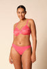 Full-body view of a women model wearing Gossard paradise pink microfibre Thong