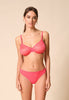General view of a women model wearing Gossard paradise pink microfibre Thong