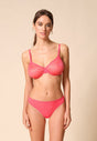 General view of a women model wearing Gossard paradise pink microfibre Thong
