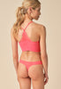 General view of a women model wearing Gossard sugar coral microfibre Thong