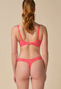 General view of a women model wearing Gossard sugar coral microfibre Thong