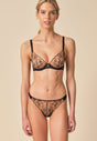 General view of a women model wearing Gossard black  Non Padded Balconette Bra