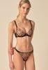 General view of a women model wearing Gossard black  Non Padded Balconette Bra