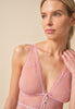 General view of a women model wearing Gossard soft pink  Cami