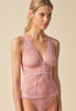 General view of a women model wearing Gossard soft pink  Cami