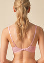 Back view of a women model wearing Gossard soft pink  Padded Plunge Bra