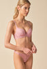 General view of a women model wearing Gossard soft pink  Padded Plunge Bra