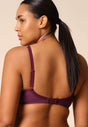 General view of a women model wearing Gossard grape wine microfibre Sheer Bra