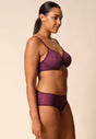 General view of a women model wearing Gossard grape wine microfibre Sheer Bra