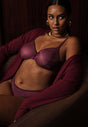 General view of a women model wearing Gossard grape wine microfibre Sheer Bra