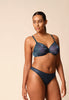 General view of a women model wearing Gossard shadow blue microfibre Sheer Bra