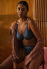 General view of a women model wearing Gossard shadow blue microfibre Sheer Bra
