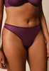 General view of a women model wearing Gossard grape wine microfibre Thong