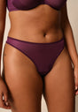 General view of a women model wearing Gossard grape wine microfibre Thong