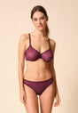Full-body view of a women model wearing Gossard grape wine microfibre Thong