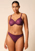 General view of a women model wearing Gossard grape wine microfibre Thong
