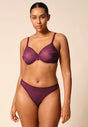 General view of a women model wearing Gossard grape wine microfibre Thong