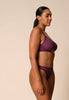 General view of a women model wearing Gossard grape wine microfibre Thong
