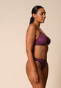 General view of a women model wearing Gossard grape wine microfibre Thong