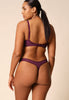 General view of a women model wearing Gossard grape wine microfibre Thong