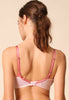 General view of a women model wearing Gossard rose light microfibre High Apex Padded Plunge Bra