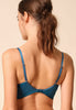 General view of a women model wearing Gossard deep teal microfibre Non Padded Plunge Bra
