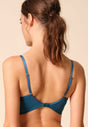 General view of a women model wearing Gossard deep teal microfibre Non Padded Plunge Bra