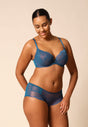 General view of a women model wearing Gossard deep teal microfibre Non Padded Plunge Bra
