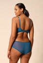 General view of a women model wearing Gossard deep teal microfibre Non Padded Plunge Bra