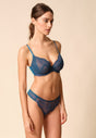 General view of a women model wearing Gossard deep teal microfibre Non Padded Plunge Bra