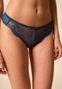 Front view of a women model wearing Gossard deep teal microfibre Thong