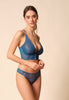 General view of a women model wearing Gossard deep teal microfibre Thong