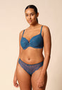 General view of a women model wearing Gossard deep teal microfibre Thong