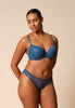 General view of a women model wearing Gossard deep teal microfibre Thong