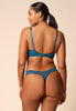 General view of a women model wearing Gossard deep teal microfibre Thong