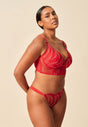 General view of a women model wearing Gossard red  Thong