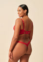 General view of a women model wearing Gossard red  Thong