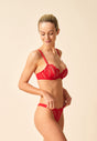 General view of a women model wearing Gossard red  Thong