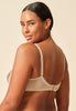 General view of a women model wearing Gossard gold  Non Padded Plunge Bra