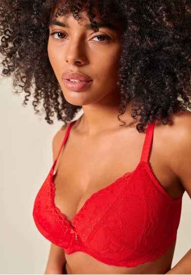 Front view of a women model wearing Gossard chilli red microfibre Padded Plunge Bra